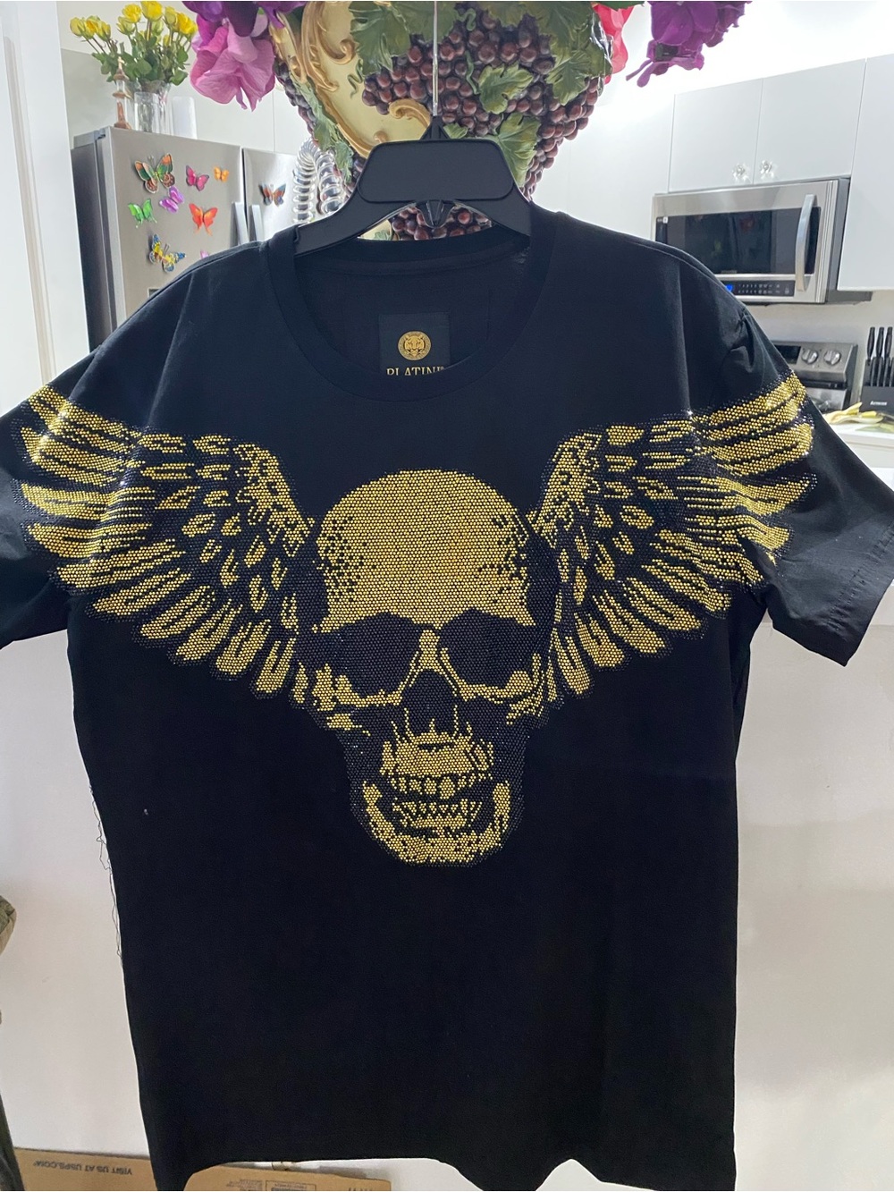 Black T‑Shirt with Gold Winged Skull Graphic